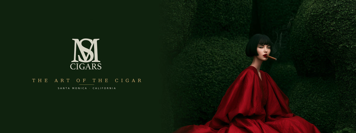 A dark promotional banner for SM Cigars featuring a woman in a flowing red dress seated in a mossy forest, holding a cigar, with the SM Cigars logo and text on a dark green background.